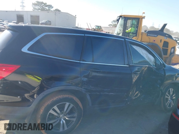 2016 Honda Pilot EX-L with VIN 5FNYF5H59GB005482, listed as a IAAI auction lot 41304248 with 127,092 mi miles and . Bid and sale history available at DreamBid. Image 14.