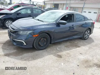 2019 Honda Civic LX with VIN 2HGFC2F61KH564474, listed as a IAAI auction lot 42156385 with 239,694 mi miles and . Bid and sale history available at DreamBid. Image 17.