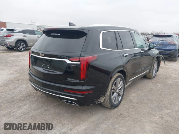 2023 Cadillac XT6 FWD Premium Luxury with VIN 1GYKPCRS8PZ231089, listed as a IAAI auction lot 41500954 with 36,455 mi miles and . Bid and sale history available at DreamBid. Image 4.