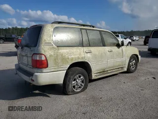 2002 Lexus LX 470 z VIN JTJHT00W623517039, wystawiony jako Copart lot #51458785 z przebiegiem 219 906 mil mil oraz Tytuł czysty. Historia ofert i sprzedaży dostępna na DreamBid. Obrazek 3.