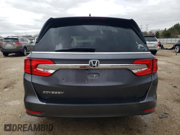 2019 Honda Odyssey EX-L with VIN 5FNRL6H74KB004916, listed as a Copart auction lot 53959205 with 60,100 mi miles and Salvage Title. Bid and sale history available at DreamBid. Image 6.