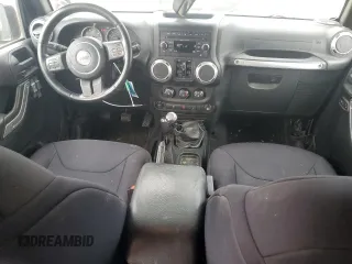 2015 Jeep Wrangler Unlimited Sahara with VIN 1C4BJWEG3FL530114, listed as a Copart auction lot 49444135 with 156,669 mi miles and Salvage Title. Bid and sale history available at carsss.com. Image 8.