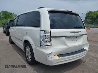 2011 Chrysler Town & Country Touring L z VIN 2A4RR8DG4BR616693, wystawiony jako IAAI lot #42492944 z przebiegiem 159 825 mil mil oraz . Historia ofert i sprzedaży dostępna na DreamBid. Obrazek 12.