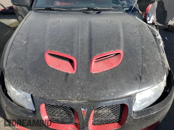 2006 Pontiac GTO z VIN 6G2VX12U26L541430, wystawiony jako Copart lot #89139855 z przebiegiem 90 918 mil mil oraz Szkoda całkowita • Salvage title. Historia ofert i sprzedaży dostępna na DreamBid. Obrazek 11.