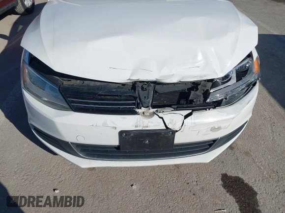 2013 Volkswagen Jetta SE with VIN 3VWDX7AJ8DM424751, listed as a IAAI auction lot 41659290 with 123,408 mi miles and . Bid and sale history available at DreamBid. Image 6.