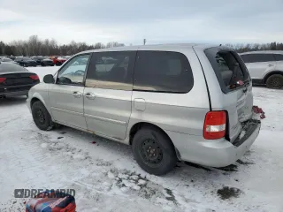 2005 Kia Sedona LX with VIN KNDUP131656722701, listed as a Copart auction lot 41604655 with 160,793 mi miles and Salvage Title. Bid and sale history available at carsss.com. Image 2.