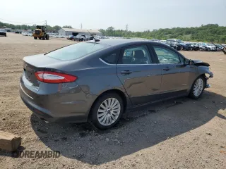 2015 Ford Fusion SE Hybrid with VIN 3FA6P0LU2FR171982, listed as a Copart auction lot 60216585 with 113,750 mi miles and Salvage title. Bid and sale history available at DreamBid. Image 3.