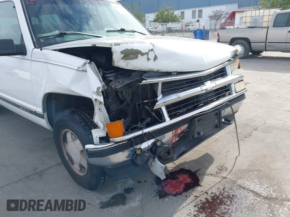 1997 Chevrolet Suburban with VIN 3GNFK16R9VG187426, listed as a IAAI auction lot 41678063 with 131,387 mi miles. Bid and sale history available at carsss.com. Image 6.
