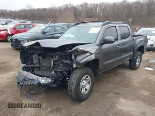2021 Toyota Tacoma SR z VIN 5TFCZ5AN3MX269374, wystawiony jako IAAI lot #41068356 z przebiegiem 54 358 mil mil oraz . Historia ofert i sprzedaży dostępna na DreamBid. Obrazek 17.