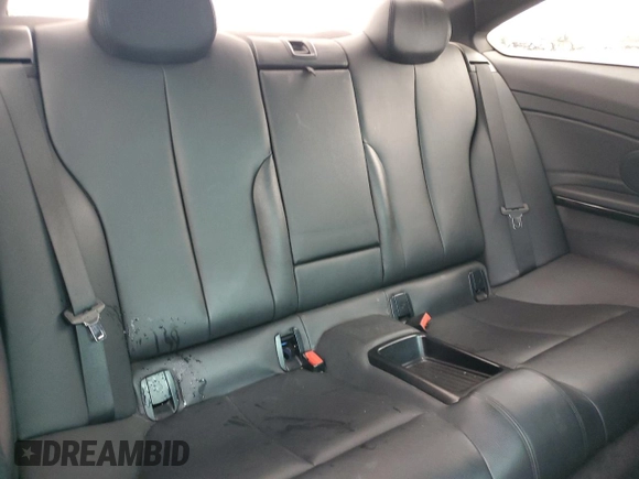 2014 BMW 4 Series 435i xDrive with VIN WBA3R5C50EK187272, listed as a Copart auction lot 56579855 with 129,873 mi miles and Salvage title. Bid and sale history available at DreamBid. Image 10.