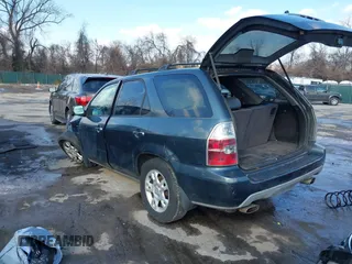 2005 Acura MDX Touring with VIN 2HNYD18935H543999, listed as a IAAI auction lot 41415777 with 301,327 mi miles. Bid and sale history available at carsss.com. Image 3.
