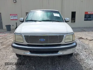 1997 Ford F-150 XL with VIN 1FTEX17L3VNB22949, listed as a IAAI auction lot 42377443 with 119,148 mi miles and . Bid and sale history available at DreamBid. Image 6.