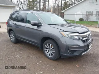 2020 Honda Pilot EX-L z VIN 5FNYF6H53LB059294, wystawiony jako IAAI lot #41910511 z przebiegiem 55 737 mil mil oraz . Historia ofert i sprzedaży dostępna na DreamBid. Obrazek 1.