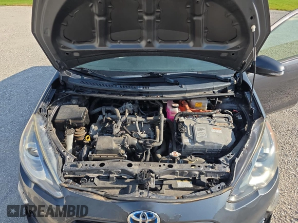 2017 Toyota Prius One z VIN JTDKDTB39H1595443, wystawiony jako Copart lot #59630785 z przebiegiem 95 719 mil mil oraz Czysty tytuł • Clean title. Historia ofert i sprzedaży dostępna na DreamBid. Obrazek 7.