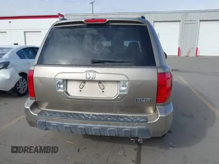 2005 Honda Pilot EX-L z VIN 2HKYF18665H523484, wystawiony jako IAAI lot #41697429 z przebiegiem 294 241 mil mil oraz . Historia ofert i sprzedaży dostępna na DreamBid. Obrazek 16.