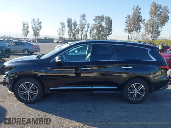 2019 Infiniti QX60 Luxe with VIN 5N1DL0MN0KC502373, listed as a IAAI auction lot 41646327 with 69,250 mi miles and . Bid and sale history available at DreamBid. Image 15.