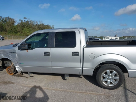 2013 Ford F-150 XL with VIN 1FTFW1CT9DKD02756, listed as a IAAI auction lot 40759592 with 218,975 mi miles. Bid and sale history available at carsss.com. Image 14.