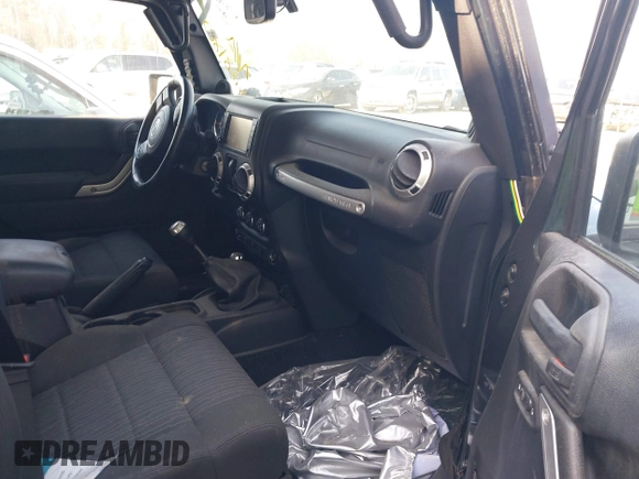 2011 Jeep Wrangler Rubicon with VIN 1J4BA6D10BL628180, listed as a IAAI auction lot 41711065 with 155,940 mi miles and . Bid and sale history available at carsss.com. Image 5.