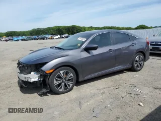 2018 Honda Civic EX-T z VIN 19XFC1F32JE200959, wystawiony jako Copart lot #58049855 z przebiegiem 95 123 mil mil oraz Szkoda całkowita • Salvage title. Historia ofert i sprzedaży dostępna na DreamBid. Obrazek 1.