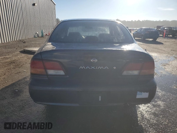 1997 Nissan Maxima GXE с VIN JN1CA21D5VT824575, выставлен на аукционе Copart как лот 85160034 с пробегом 94 387 миль миль и Списание • Salvage title. История ставок и продаж доступна на DreamBid. Изображение 6.