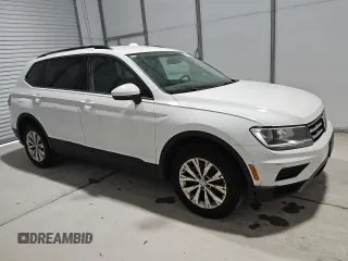 2018 Volkswagen Tiguan S with VIN 3VV0B7AX0JM084884, listed as a Copart auction lot 59162025 with 106,399 mi miles and Clean title. Bid and sale history available at DreamBid. Image 4.