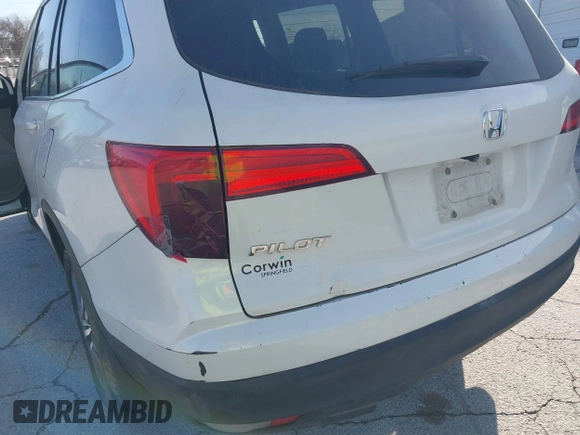2016 Honda Pilot EX-L with VIN 5FNYF5H5XGB016152, listed as a IAAI auction lot 41820023 with 210,474 mi miles and . Bid and sale history available at DreamBid. Image 6.