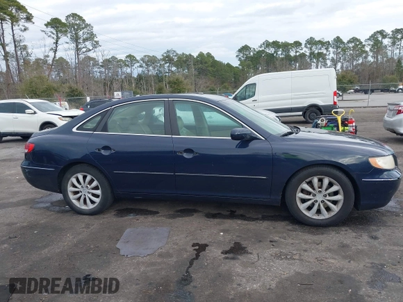 2006 Hyundai Azera SE with VIN KMHFC46F86A110023, listed as a IAAI auction lot 41427898 with 197,837 mi miles and . Bid and sale history available at DreamBid. Image 13.