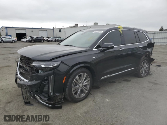 2022 Cadillac XT6 Premium Luxury with VIN 1GYKPDRS5NZ110989, listed as a Copart auction lot 69600894 with 56,148 mi miles and Salvage Title. Bid and sale history available at carsss.com. Image 1.