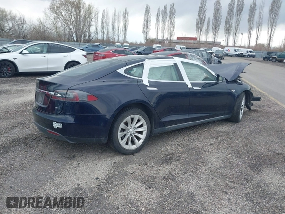 2015 Tesla Model S 85D with VIN 5YJSA1H23FFP79020, listed as a IAAI auction lot 41819392 with Not Provided miles. Bid and sale history available at carsss.com. Image 4.