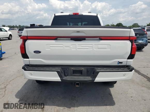 2022 Ford F-150 Lightning Pro with VIN 1FTVW1EL3NWG16146, listed as a Copart auction lot 65322785 with 68,928 mi miles and Salvage title. Bid and sale history available at DreamBid. Image 6.