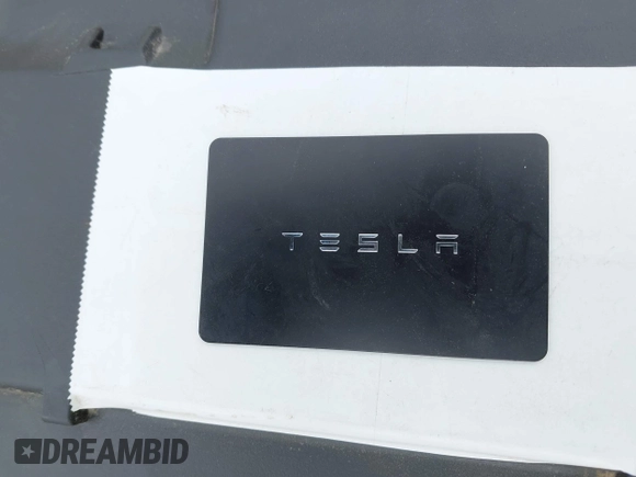 2019 Tesla Model 3 Mid Range with VIN 5YJ3E1EA6KF415656, listed as a IAAI auction lot 42140763 with 71,408 mi miles and . Bid and sale history available at carsss.com. Image 11.