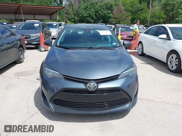 2018 Toyota Corolla L z VIN 5YFBURHE4JP820560, wystawiony jako IAAI lot #42317624 z przebiegiem 84 946 mil mil oraz . Historia ofert i sprzedaży dostępna na DreamBid. Obrazek 12.