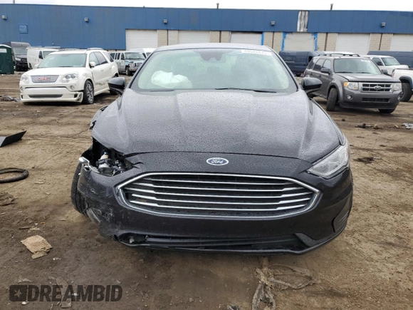 2020 Ford Fusion SE z VIN 3FA6P0HDXLR186671, wystawiony jako Copart lot #49582675 z przebiegiem 37 700 mil mil oraz Szkoda całkowita • Salvage title. Historia ofert i sprzedaży dostępna na DreamBid. Obrazek 5.
