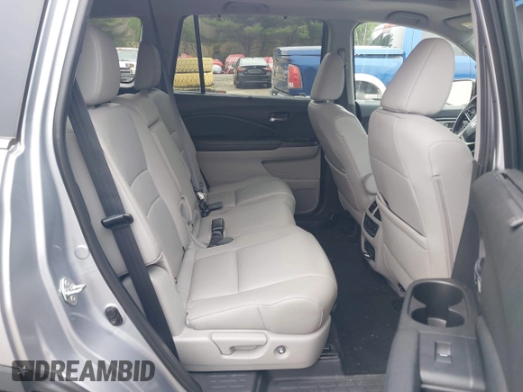 2020 Honda Pilot Touring 8-Passenger z VIN 5FNYF6H91LB042626, wystawiony jako IAAI lot #42249440 z przebiegiem 57 429 mil mil oraz . Historia ofert i sprzedaży dostępna na DreamBid. Obrazek 8.