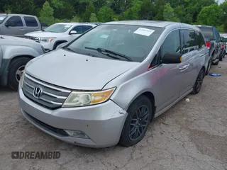 2011 Honda Odyssey Touring with VIN 5FNRL5H93BB071518, listed as a IAAI auction lot 42402421 with 227,647 mi miles and . Bid and sale history available at DreamBid. Image 17.