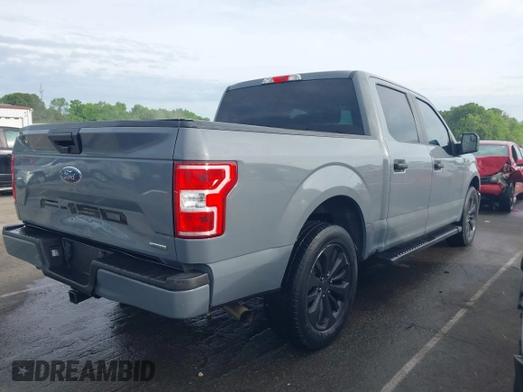 2020 Ford F-150 XL with VIN 1FTEW1CPXLKD05369, listed as a IAAI auction lot 42082934 with 64,954 mi miles and . Bid and sale history available at DreamBid. Image 4.
