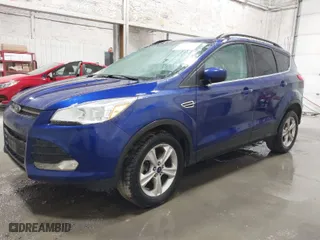 2014 Ford Escape SE with VIN 1FMCU9GX2EUC69010, listed as a IAAI auction lot 41928413 with 145,781 mi miles. Bid and sale history available at carsss.com. Image 2.