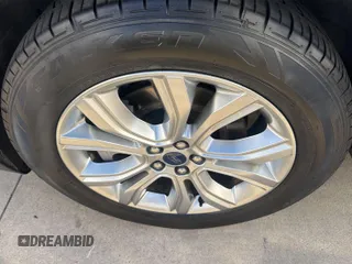2021 Ford Edge Titanium with VIN 2FMPK3K96MBA51234, listed as a IAAI auction lot 42886659 with 74,183 mi miles and . Bid and sale history available at DreamBid. Image 16.