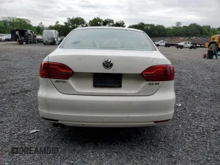 2011 Volkswagen Jetta SE with VIN 3VWDX7AJ3BM320522, listed as a Copart auction lot 60617095 with 164,863 mi miles and Salvage title. Bid and sale history available at DreamBid. Image 6.