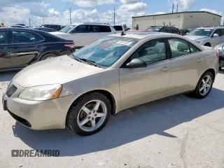 2009 Pontiac G6 1SA with VIN 1G2ZG57N794180136, listed as a Copart auction lot 56570035 with 230,182 mi miles and Clean title. Bid and sale history available at DreamBid. Image 1.