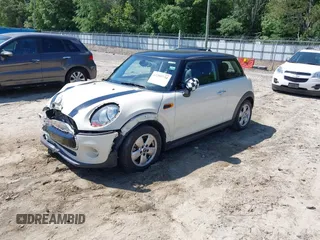 2016 MINI Hardtop z VIN WMWXP5C51G3B77048, wystawiony jako IAAI lot #42205734 z przebiegiem 89 954 mil mil oraz . Historia ofert i sprzedaży dostępna na DreamBid. Obrazek 2.