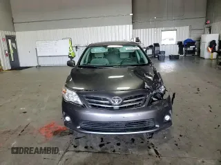 2013 Toyota Corolla L with VIN 5YFBU4EE7DP211250, listed as a Copart auction lot 53884715 with 70,723 mi miles and Salvage Title. Bid and sale history available at DreamBid. Image 13.