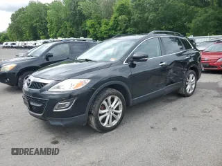 2011 Mazda CX-9 Grand Touring z VIN JM3TB3DVXB0305949, wystawiony jako Copart lot #58181515 z przebiegiem 135 062 mil mil oraz Szkoda całkowita • Salvage title. Historia ofert i sprzedaży dostępna na DreamBid. Obrazek 1.