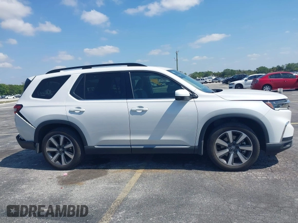 2024 Honda Pilot Touring z VIN 5FNYG2H72RB016937, wystawiony jako IAAI lot #42137854 z przebiegiem 18 028 mil mil oraz . Historia ofert i sprzedaży dostępna na DreamBid. Obrazek 13.