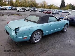 2002 Ford Thunderbird Hardtop Premium with VIN 1FAHP60A02Y121714, listed as a Copart auction lot 77852994 with 132,049 mi miles and Salvage Title. Bid and sale history available at DreamBid. Image 3.
