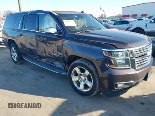 2015 Chevrolet Suburban LTZ with VIN 1GNSCKKC6FR280327, listed as a IAAI auction lot 41467847 with 164,287 mi miles and . Bid and sale history available at DreamBid. Image 1.