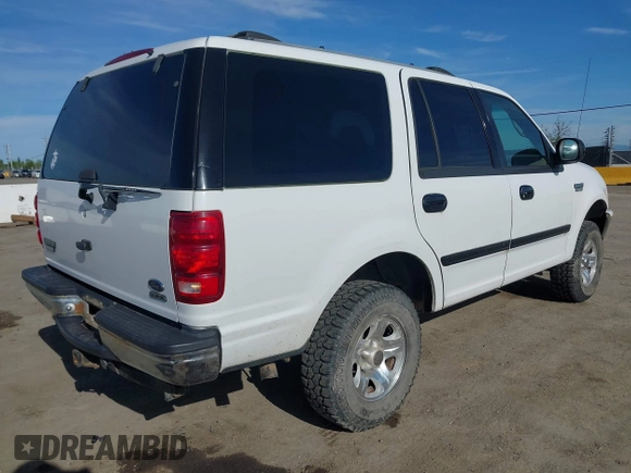 1999 Ford Expedition XLT z VIN 1FMPU18L0XLB52467, wystawiony jako IAAI lot #42018037 z przebiegiem 288 327 mil mil oraz . Historia ofert i sprzedaży dostępna na DreamBid. Obrazek 4.