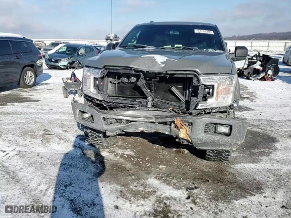 2018 Ford F-150 XL with VIN 1FTEW1EG7JFB63999, listed as a Copart auction lot 87753395 with 149,116 mi miles and Salvage Title. Bid and sale history available at carsss.com. Image 11.