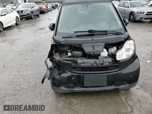 2012 Smart fortwo Pure with VIN WMEEJ3BAXCK568065, listed as a Copart auction lot 84398194 with 73,989 mi miles and Clean title. Bid and sale history available at DreamBid. Image 11.