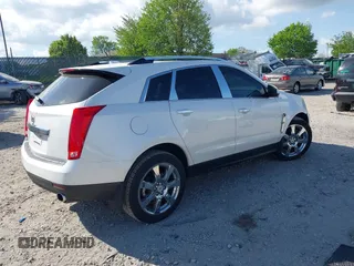 2011 Cadillac SRX Performance Collection z VIN 3GYFNBEYXBS543819, wystawiony jako IAAI lot #42159051 z przebiegiem Nie podano mil oraz . Historia ofert i sprzedaży dostępna na DreamBid. Obrazek 4.